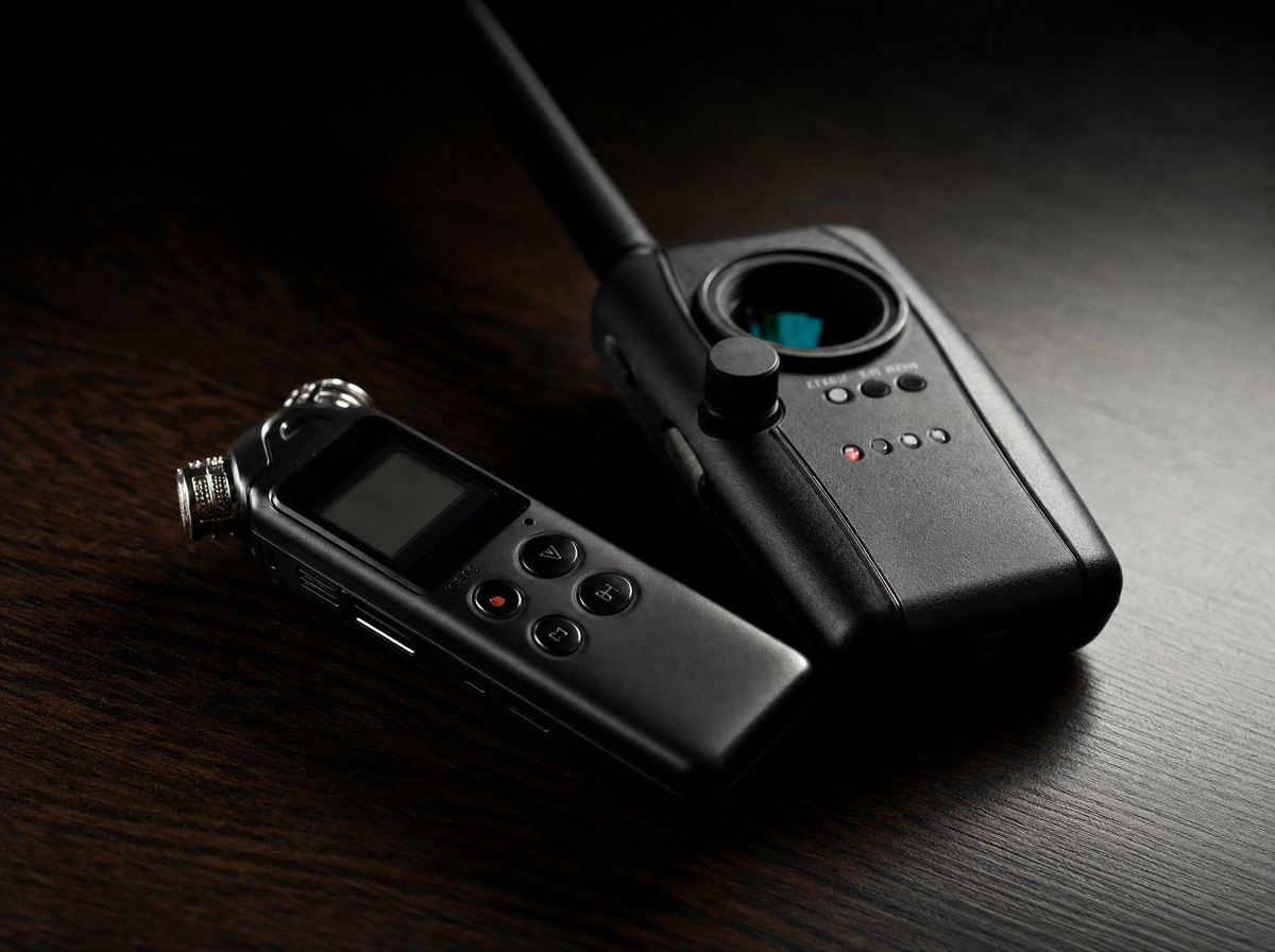 Small audio recorder on a dark surface